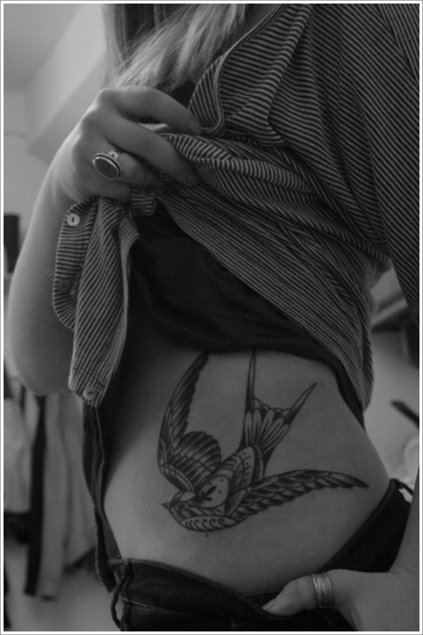 Lovely swallow side tattoo