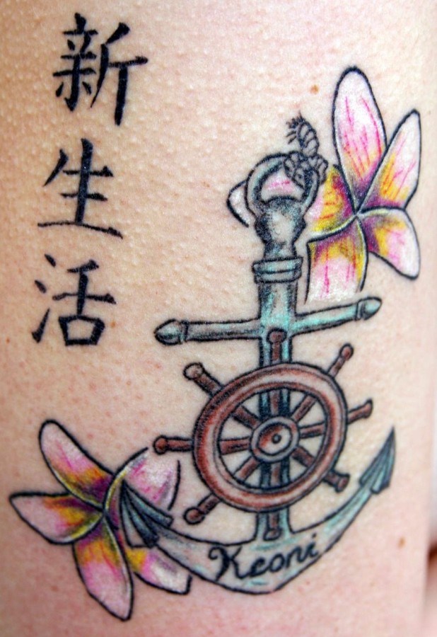 Lovely wheel and anchor tattoo