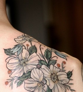 Lovely white flowers tattoo by Alice Kendall