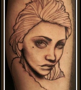 Lovely woman arm tattoo