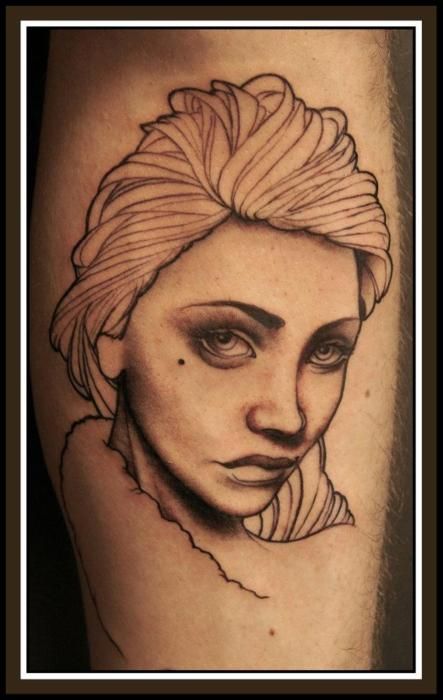 Lovely woman arm tattoo