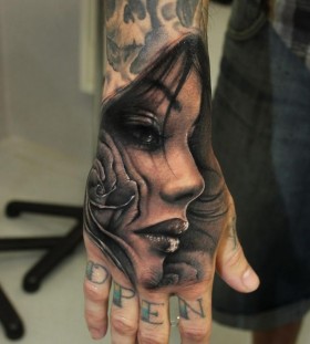 Lovely woman hand tattoo by Riccardo Cassese