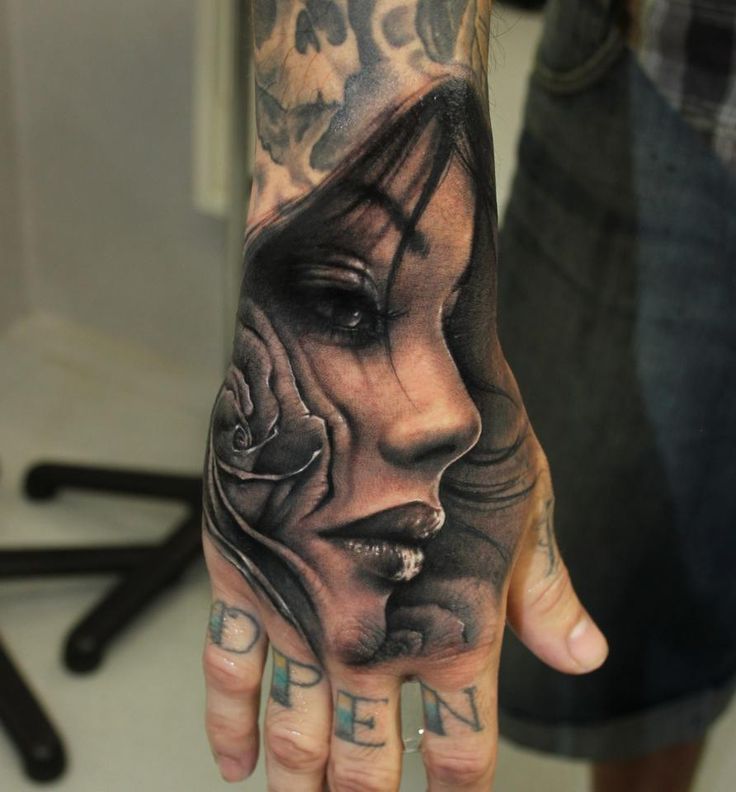 Lovely woman hand tattoo by Riccardo Cassese