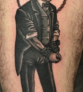 Man tied with chains tattoo by Philip Yarnell