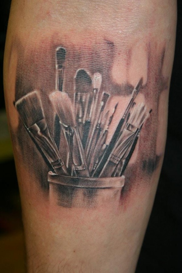 Many paint brushes tattoo