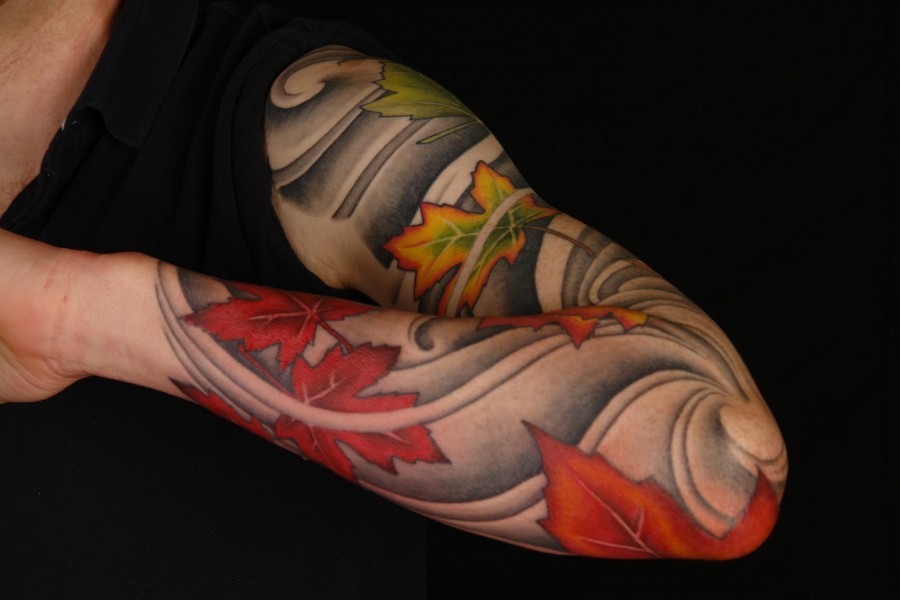 Maple leaves full sleeve tattoo