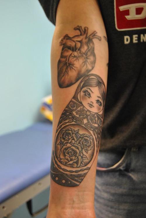 Matryoshka and heart tattoo