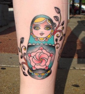 Matryoshka with flower tattoo