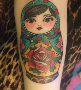 Matryoshka with rose tattoo