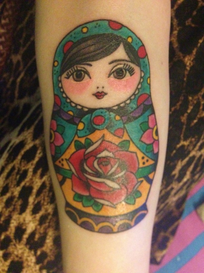 Matryoshka with rose tattoo