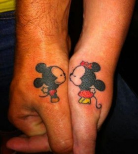 Mickey and Minnie thumb tattoos