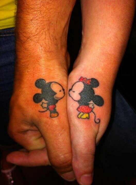 Mickey and Minnie thumb tattoos