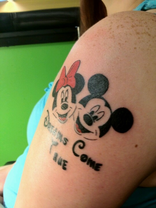 Minnie and Mickey and writing tattoo