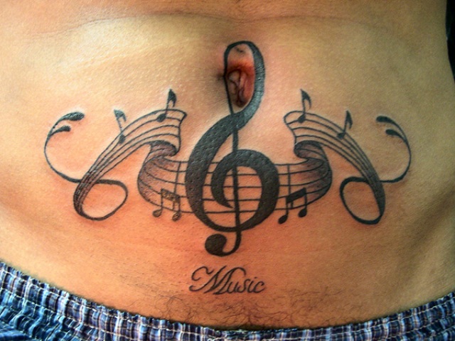 Music notes stomach tattoo