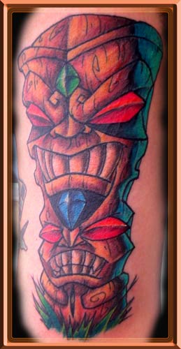 Nice double tiki tattoo