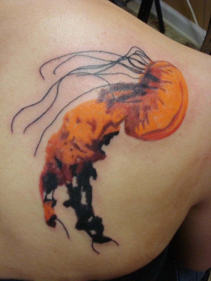 Nice jellyfish back tattoo