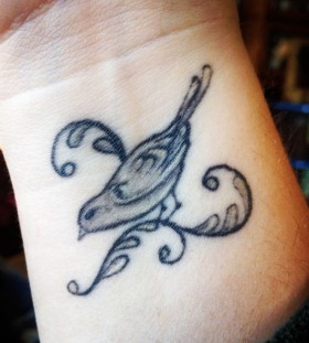 Nice mockingbird wrist tattoo