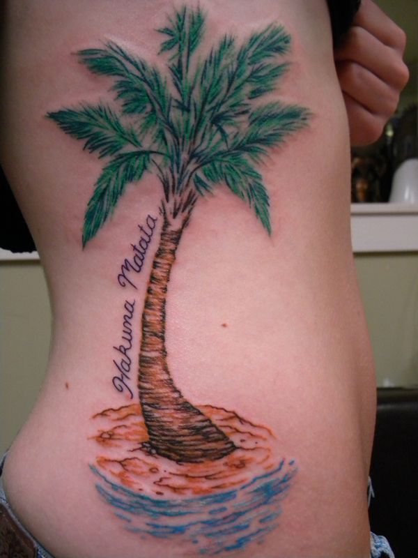 Nice palm tree side tattoo