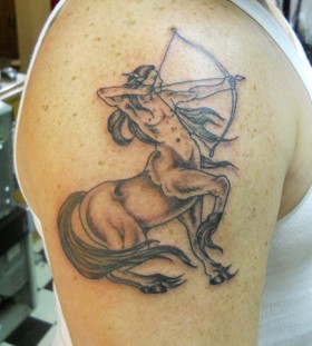 Nice sagittarius arm tattoo