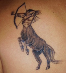 Nice sagittarius back tattoo