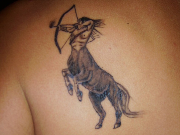 Nice sagittarius back tattoo