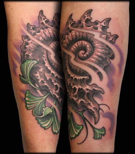 Nice sea shell tattoo