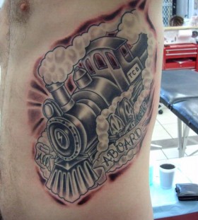 Nice steaming train side tattoo