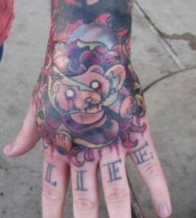 Nice teddy bear hand tattoo
