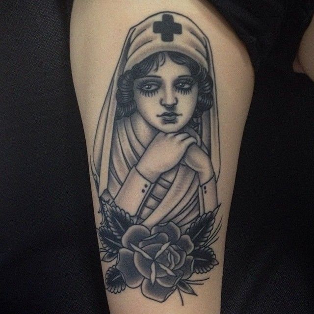 Nurse and flowers tattoo