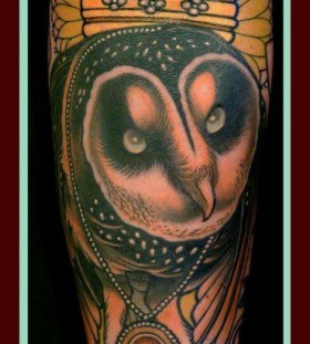 Owl with crown tattoo by Lars Uwe Jensen