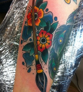 Paint brush and flowers tattoo