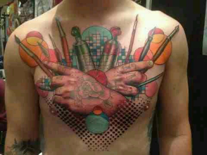 Paint brush chest tattoo