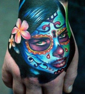 Painted face woman tattoo by Kyle Cotterman