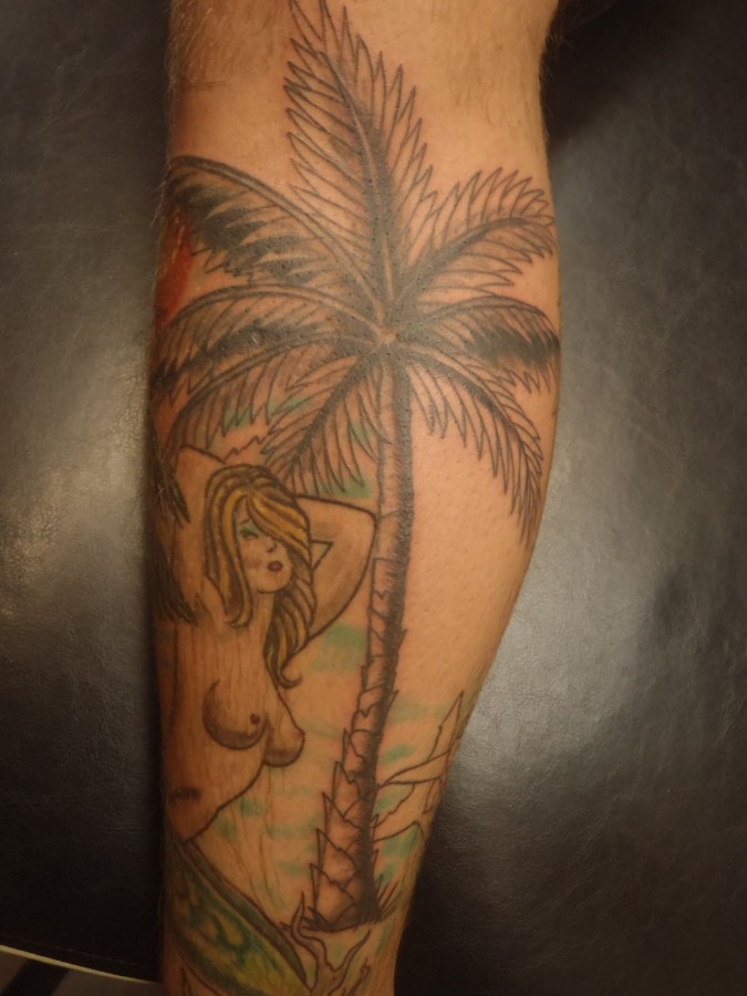 Palm tree and girl tattoo