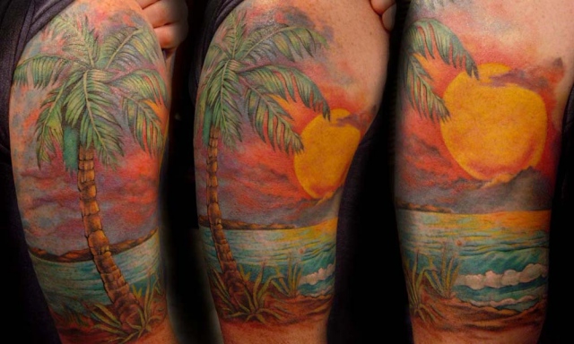 Palm tree and sunset tattoo