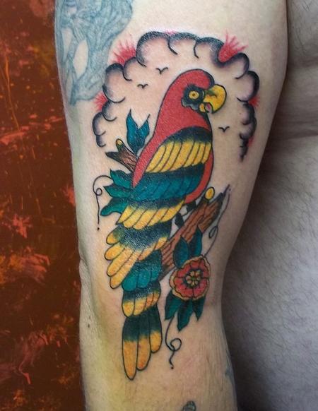 Parrot on a branch tattoo