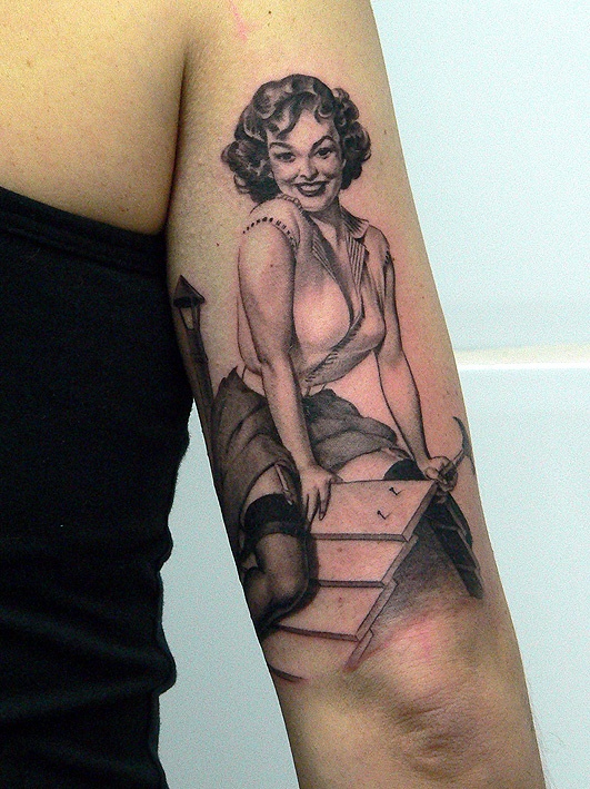 Pin up girl tattoo by Xavier Garcia Boix