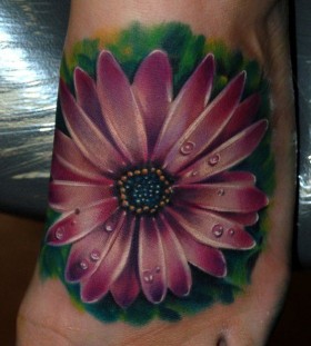 Pink flower tattoo by Kyle Cotterman