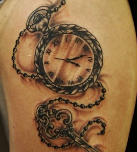 Pocket watch and key tattoo