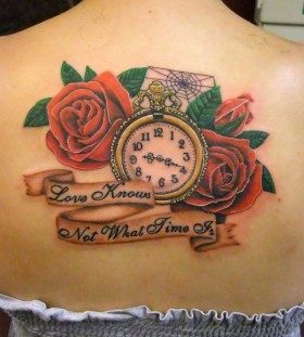 Pocket watch and roses tattoo