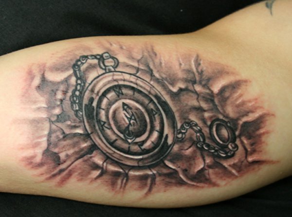 Pocket watch arm tattoo