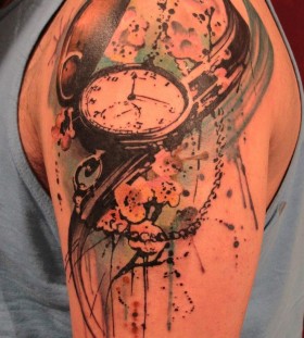 Pocket watch arm tattoo