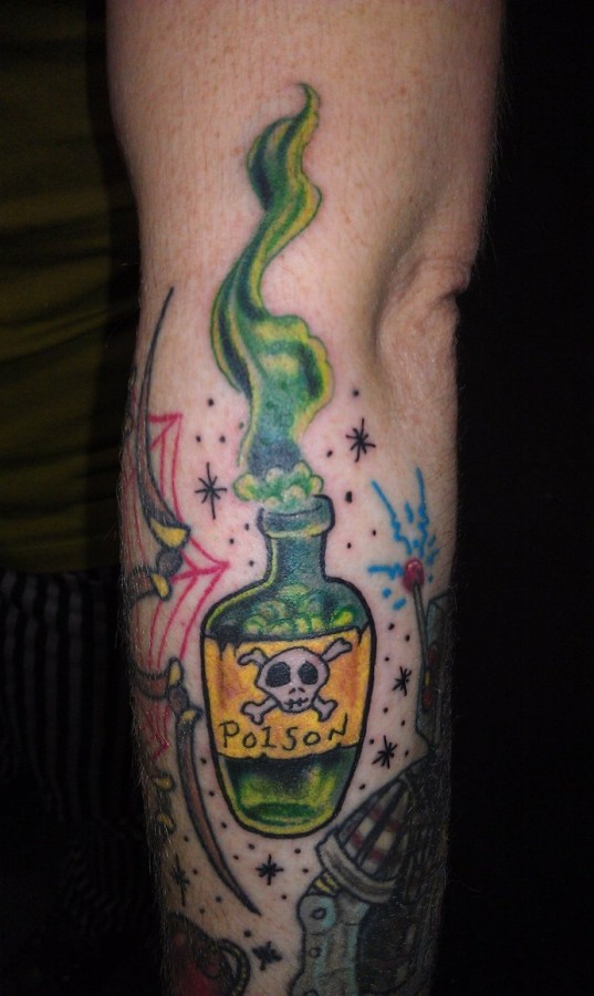 Poison bottle arm tattoo