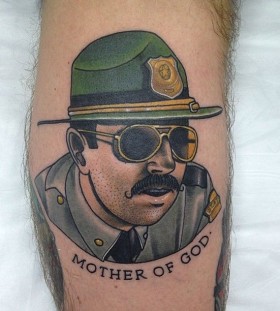 Police officer tattoo by Dan Molloy