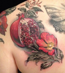 Pomergranate back tattoo by Esther Garcia
