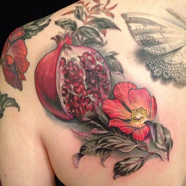 Pomergranate back tattoo by Esther Garcia