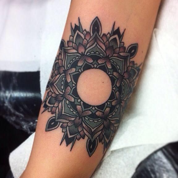 Pretty arm tattoo by Flo Nuttall