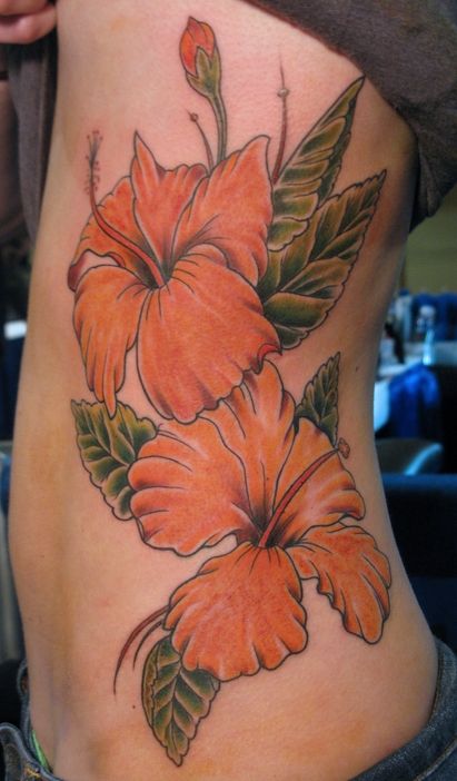 Pretty flowers side tattoo by Jon Mesa