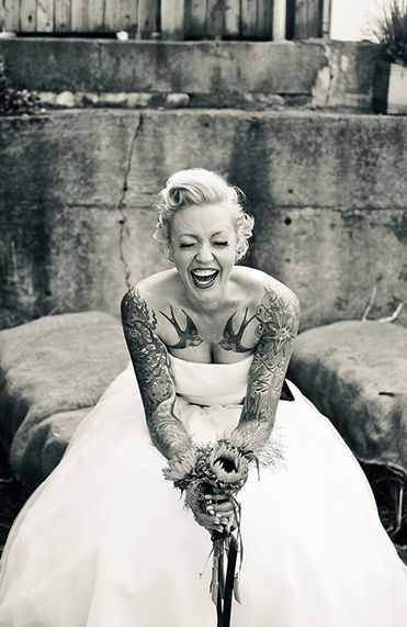 Pretty smiling bride tattoo