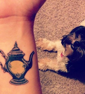 Pretty teapot arm tattoo